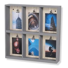 a display case with six pictures hanging on the sides and four clips attached to each other