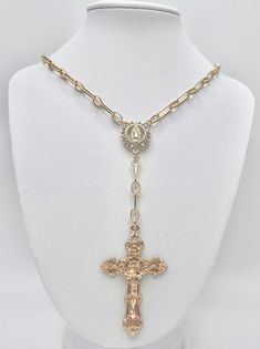 14k gold filled chain with large gold plated cross pendant and Swarovski crystal Our Lady connector. Necklace is 22 inches total length (including 2 inch extender). The cross pendant is 1.75 inches in length. Gold-tone Cross Jewelry With Adjustable Chain, Adjustable Crucifix Chain Jewelry, Gold-plated Cross Necklace With Adjustable Chain, Gold Plated Cross Necklace With Adjustable Chain, Gold Chain Jewelry With Cross Pendant, Gold Cross Chain Necklace With Adjustable Chain, Gold Cross Necklace With Adjustable Chain, Cross Pendant Necklace, Gold Filled Chain