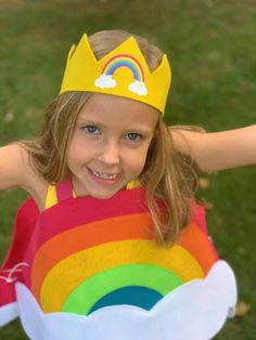 Let your little hero shine in our vibrant, handmade rainbow costume! Perfect for birthdays, Halloween, school plays, and everyday fun, this unique design adds a splash of color to any occasion. Crafted & designed by a mom of 4, this high-quality costume will brighten everyone's day. ✨ One-of-a-kind handmade rainbow costume ✨ Available in two color options: Pink or Red Rainbow ✨ Soft, comfortable felt material with rainbow & cloud design on front and back ✨ Matching accessories available: hair bow, crown, & rainbow arm bands ✨ Sizing fits walkers up to age 7 ✨ Fast shipping options available ✨ Free shipping via first class mail, with upgrades to priority or express ✨Made in the USA! Add some magic to your child's day with this charming costume! 🌟 Rainbow Dress Up, Rainbow Costume, Rainbow Costumes, Kids Rainbow, Cloud Design, Costume For Halloween, School Play, Rainbow Brite, Clouds Design