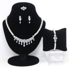 These Beautiful Romantic CUBIC ZIRCONIA FLOWER DIAMOND CRYSTAL BRIDAL NECKLACE are made of very fine quality of Swarovski crystals for your special day! The material used in these Necklace and earrings set are free from Lead, Nickel, Cadmium so it will not give you any skin irritation and environment friendly too.. MEASUREMENTS :- Necklace measures about 19.5 inches adjustable around your neck.  Earrings measures about 1 inches long 0.4 inches wide. Bracelet width: 0.5 inches; Bracelet length: 8 Bridal Necklace Set, Gold Luxury, Wide Bracelet, Luxury Flowers, Jewelry Statement, Skin Irritation, Bride Jewellery, Environment Friendly, Wedding Jewelry Sets