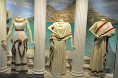 four mannequins dressed in greek costumes on display at the museum's exhibit