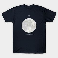 a black t - shirt with the moon on it's chest and writing, one in