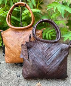 Rugged meets refined design in this handcrafted herringbone pattern tote. Round lightly padded handles are comfortable on the shoulder and in the hand. Bag also can be worn with an adjustable crossbody strap. Brown Crossbody Bag With Rolled Handles, Brown Shoulder Bag With Rolled Round Handles, Shoulder Bag With Rolled Handles For Everyday, Brown Hobo Bag With Rolled Top Handles, Everyday Crossbody Satchel With Rolled Handles, Everyday Crossbody Bag With Rolled Handles, Everyday Use Crossbody Satchel With Rolled Handles, Tote Pattern, The Hand