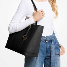 Michael Kors Jet Set Travel Large Top Zip Shoulder Tote Saffiano Leather Black Nwt 100% Authentic Style# 35f0gtvt9l Was $448.00$ Mk Note: Our Jet Set Travel Tote Is A Timeless Style For Every Season. Crafted From Saffiano Leather Accented With A Top-Stitch Trim, It Opens To A Spacious Interior With Plenty Of Room To Store All Your Essentialsbe It For A Day Or For An Entire Weekend. Use The Inside Slip Pocket To Stow Small Items That Require Easy Access. Details Tote Bag Saffiano Leather 100% Lea Saffiano Leather Shoulder Bag For Work With Branded Hardware, Elegant Michael Kors Shoulder Bag For Work, Michael Kors Black Shoulder Bag For Work, Michael Kors Saffiano Leather Everyday Shoulder Bag, Michael Kors Saffiano Leather Shoulder Bag, Classic Michael Kors Shoulder Bag For Work, Michael Kors Saffiano Leather Office Bag, Modern Saffiano Leather Shoulder Bag, Classic Michael Kors Shoulder Bag For Office