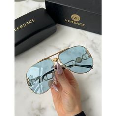 Brand New Versace Ve2255 Gold Aviator Sunglasses. Ultra Oversized Pilot Aviator Frames In Gold Metal With Tinted Blue Lenses And Medusa Logos On Bridge And Legs. 100% Uva/Uvb Protected Lens. Adjustable Nose Pads. Measures 63-13-145. Retail Price $372. Comes With Box, Case, Cloth, And All Papers. Luxury Blue Sunglasses With Uva Protection, Designer Blue Sunglasses With Gradient Lenses, Blue Aviator Sunglasses With Tinted Lenses, Trendy Blue Aviator Sunglasses With Gradient Lenses, Blue Gradient Aviator Sunglasses With Glass Lenses, Blue Gradient Aviator Sunglasses, Modern Blue Glass Aviator Sunglasses, Luxury Blue Sunglasses For Summer, Gold Aviator Sunglasses