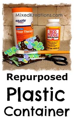 a pair of scissors and some glue sitting next to the words repurposed plastic container