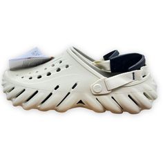 Crocs Echo Clogs Mens 10 Womens 12 Bone Black Comfort Walking Adjustable Strap Please Take Note Of The Following Information: * Item Measurements Are Approximate. Please Compare Our Measurement Photos With Your Favorite Clothes To Ensure The Proper Fit. * All Pre-Owned Items Are Cleaned According To Policies And Guidelines. * Please Note That The Actual Color Of The Item May Differ Slightly From The Picture Due To Lighting Effects And Computer Color. * Due To Manual Measurement, Please Allow For Crocs Echo, Mens Clogs, Women's Crocs, Crocs Shoes, Mule Clogs, Mules Shoes, Clogs, Favorite Outfit, Bones