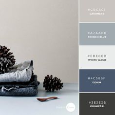 the color scheme is grey, white and gray with some pine cones on top of it