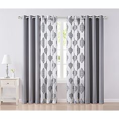 the curtains in this room are gray and white