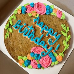 a birthday cake with the words happy birthday written on it