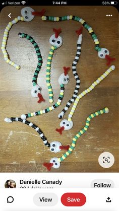 the beads are made to look like they have been decorated with skulls and other decorations