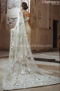 Buy Latest Pakistani Saree Online a gorgeous masterpiece in Ivory color adorned with stones and beads. Net Saree is perfectly elegant for your Big day Elegant Off White Dupatta For Reception, Elegant Off-white Dupatta For Reception, Elegant Wedding Dress With Dupatta And Traditional Drape, White Hand Embellished Traditional Wear For Festive Occasions, Elegant Wedding Dress With Traditional Drape And Dupatta, Festive White Hand Embellished Traditional Wear, Festive White Hand-embellished Traditional Wear, Traditional White Wedding Dress With Drape, Elegant Wedding Dress With Traditional Drape