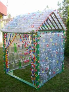 an image of a house made out of plastic bottles