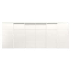 a white wall with several squares on it