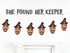 there is a man wearing a witches hat on top of a shelf with the words, she found her keeper