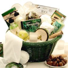 a basket filled with personal care items on top of a white countertop next to a plate