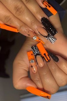 unique halloween nails Halloween Coffin Shaped Nails, Bougie Halloween Nails, Halloween Nails Acrylic Orange, Halloween Acyrilics Nails, Halloween Rhinestone Nails, Halloween Nails Inspiration, Orange Halloween Nail Designs, Halloween Nails Acrylic Square, Cute Spooky Nails