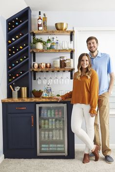 The corner bar features a wine rack, beverage cooler, and stemware holders. Corner Bar Ideas, Bar Nook, Built In Wine Rack, Home Bar Cabinet, Bar Sala, Corner Bar, Coffee Bars In Kitchen