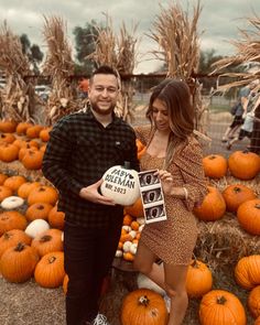 Baby announcement at the pumpkin patch Pumpkin Patch Photoshoot Maternity, Pumpkin Patch Pregnancy Pictures, Maternity Pumpkin Patch Photos, Pumpkin Patch Maternity Pictures, Pumpkin Pregnancy Announcement, Pumpkin Patch Photoshoot