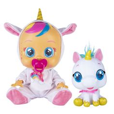 the baby doll is next to the toy unicorn