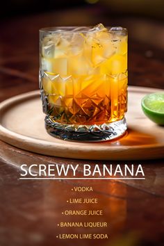 the cover of screwy banana vodka on a wooden tray with limes and lemon