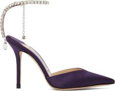 Satin heels in purple. · Pointed toe · Hook-eye ankle strap · Crystal-cut charm at heel · Logo patch at leather footbed · Covered stiletto heel · Suede sole · Heel: H4 in Supplier color: Cassis/Crystal Purple Satin Heels, Blue Satin Heels, Jimmy Choo Pumps, Purple Heels, Crystal Heels, Silver Pumps, Crystal Shoes, Studded Heels, Satin Heels