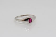 Vintage Sterling Silver Ruby Bold Ring...Marked 925....Total of weights 1.2grams... Size 4...Measure of Face 6.1MM...It's in very good condition. B Handmade Classic Silver Ruby Ring, Silver Ruby Ring Collectible, Vintage Silver Ruby Ring Hallmarked, Hallmarked Sterling Silver Open Ruby Ring, Vintage Silver Ruby Ring, Hallmarked, Bold Rings, Vintage Sterling Silver, Ruby, Gemstone Rings