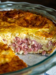 a close up of a pie with meat in it