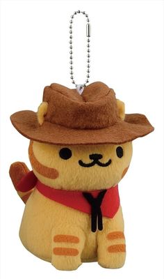 a stuffed animal with a hat and scarf on it's head is hanging from a key chain