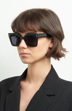 An angular silhouette and scratch-resistant CR-39 lenses enhance the sleek style of these full-coverage sunglasses featuring a logo inlay at the left temple. 52mm lens width; 22mm bridge width; 145mm temple length 100% UV protection CR-39 lenses Acetate Imported Modern Rectangular Sunglasses With Tinted Lenses, Modern Rectangular Cat Eye Sunglasses With Mirrored Lenses, Modern Cat Eye Shield Sunglasses, Isabel Marant Sunglasses, Modern Cat Eye Sunglasses With Uva Protection, Modern Cat Eye Sunglasses With Polarized Wayfarer Lenses, Modern Rectangular Sunglasses With Mirrored Lenses, Contemporary Cat Eye Sunglasses With Gradient Lenses, Modern Cat Eye Shield Sunglasses With Uv Protection