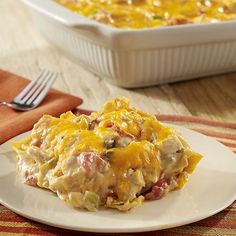 a casserole dish on a plate with a fork