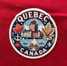 a sticker with the words quebec canada in front of a red background