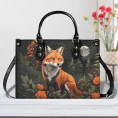 "Our 11 inch Fox Purse is obsess-worthy. It's the perfect accessory for any woman who loves the cottagecore aesthetic. This beautiful shoulder bag features a stunning orange and gray themed design and the luxury style satchel purse offers plenty of room for all your essentials, making it so practical and stylish.  Whether you're heading out on a weekend adventure or running errands around town, this purse is sure to become your go-to accessory. Plus, it makes a great gift for any stylish woman in your life who loves cute forest animals. Give the gift of practical luxury with this gorgeous Fox Purse. ► ABOUT THIS LUXE JANE PURSE * Colors & Design: Dark Gray and Orange Fox, Flowers * The handle and trim are your choice of black or white * Two top handles (not removable) * Removable shoulder Fox Purse, Ipad Storage, School Bag College, Fleur Orange, Business Briefcase, Orange Fox, Travel Tote Bag, Cottagecore Aesthetic, Purse Styles