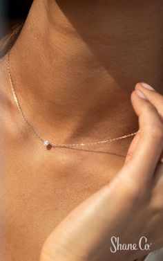 This is the diamond necklace that you won't ever want to take off. Considered a jewelry essential, this simply elegant necklace displays one bezel-set brilliant round diamond. Crafted from quality 14k rose gold, this 4.5mm wide setting hangs from a matching 18″ cable chain that can be shortened to 16″ if desired. Article number: 41084045 Dainty Rose Gold Necklaces With Bezel Setting, Dainty Rose Gold Necklace With Bezel Setting, Dainty Diamond Necklace With Bezel Setting, Tiffany Diamond Necklace, Diamond Necklace With Smooth Bezel For Gift, Luxury Minimalist Diamond Necklace With Bezel Setting, Gift Diamond Necklace With Smooth Bezel, Gift Smooth Bezel Diamond Necklace, Gold Diamond Necklace With Smooth Bezel