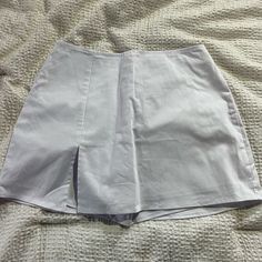 High Waist Summer Skort With Lined Skirt, High Waist Lined Skort For Summer, Solid Color Summer Mini Skort, Summer Mini Skirt With Lining, Summer Mini Skirt With Lined Detail, Solid Color Short Summer Skirt, Short Solid Skirt For Day Out, Summer Cotton Lined Skort, Relaxed Fit Solid Skort For Day Out