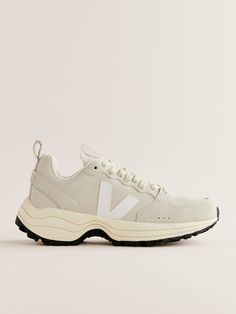 Dad shoes but make them hot. Shop the Veja Venturi Sneaker from Reformation, a sneaker made with recycled plastic bottles and responsibly sourced leather. Modern Sneakers For Running Errands In Spring, Modern Sneakers For Spring Errands, Modern Sneakers For Spring, Veja Venturi, Sustainable Shoes, Dad Shoes, Swimming Outfit, Vintage Inspired Dresses, Natural Latex