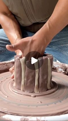 a man is making a cake with chocolate icing