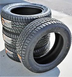 four tires are stacked on top of each other