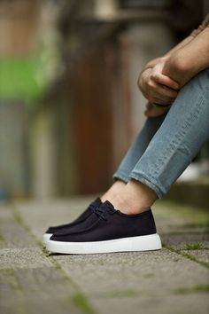 Classic Navy Sneakers With Textured Sole, Blue Casual Low-top Dress Shoes, Casual Blue Low-top Dress Shoes, Classic Navy Slip-on Sneakers, Classic Navy Plain Toe Sneakers, Modern Business Casual Sneakers With Textured Sole, Modern Business Casual Sneakers With Leather Sole, Modern Low-top Dress Shoes With Textured Sole, Modern Low-top Dress Shoes With Stitched Sole