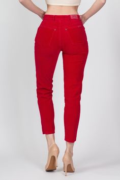 Vintage 80s/90s high waisted red corduroy pants with a tapered leg. Measurements and Condition: Fits like: Labeled size 5, fits modern women's extra small/petite Fabric: Cotton Brand: Bonjour Condition: Very good, with light general wear, and a 1.5" faint dark spot on the right seat (see photos) Waist: 24" Hips: 36" Rise: 10.25" Inseam: 26.75" See our FAQ section for more information on sizing and condition ratings. Red High-waist Corduroy Bottoms, High Waist Red Corduroy Pants, Red Corduroy Bottoms With Pockets, Red Straight Leg Corduroy Bottoms, Red Corduroy Bottoms For Fall, Red Fitted Corduroy Bottoms, Fitted Red Corduroy Bottoms, Fitted Red Corduroy Pants, Red Corduroy Jeans For Fall