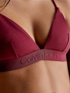 A triangle bikini top made with a minimal look. Designed with adjustable shoulder straps for a personalized fit. Finished with a Calvin Klein logo underband.  Material: 74% Polyamide, 26% Elastane. Top Calvin Klein, Calvin Klein Swimwear, Minimal Look, Motorcycle Outfit, Triangle Bra, Boxing, Cranberry, Womens Swim, Shoulder Straps