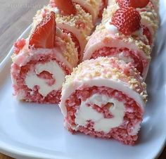 strawberry roll with cream cheese and strawberries on top