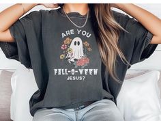 Get into the Halloween spirit with this 'Fall-o-ween Jesus'  garment-dyed T-shirt. Featuring a unique design with a mix of Halloween and Jesus elements, this tee is perfect for the fall season. It offers a relaxed fit for ultimate comfort in casual or semi-formal settings, making it a versatile addition to any wardrobe. This tee is relevant to Halloween enthusiasts, Christians looking for a festive twist, and anyone who enjoys a playful design for the fall season. ✿ＳＰＥＣＩＦＩＣＡＴＩＯＮＳ Product feature Fall O, Halloween Tshirt, Jesus Bible, Christian T Shirt, Ghost Shirt, Christian Tees, Christian Apparel, Follow Jesus, Product Feature