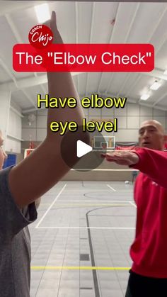 the elbow check is being held up by two men in an indoor basketball court with text that reads, have elbow eye level