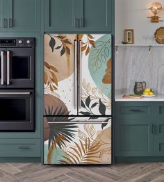 a kitchen with green painted cabinets and an oven in the center, next to a marble counter top