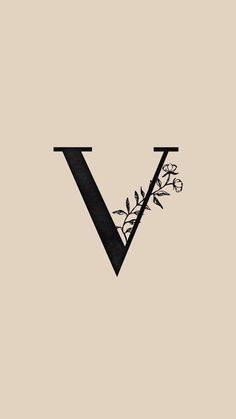 the letter v is made up of black letters with flowers on them and leaves growing out of it