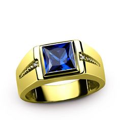 Metal: 10k Yellow Gold Sapphire: carat total weight - 3.20 0.7cm x 0.7cm setting - Bezel setting Diamonds: carat total weight - 0.01 color - H clarity - VS1 setting - Pave setting Power and beauty come to mind in the presence of this stunning 10k gold ring. One blue sapphire anchors the piece at the center, accented with two diamonds. Always elegant, classic and sophisticated! ----------------------------------------------------------------------Sapphire The magnificent and holy Sapphire, in all Mens Sapphire Ring, Mens Gemstone Rings, Ring Square, 10k Gold Ring, Medieval World, Silver Jewels, Men Diamond Ring, Pave Setting, 14k Gold Ring