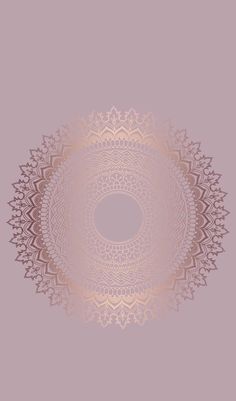 an image of a circular object in the middle of a pink and beige background with gold accents