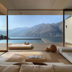 Japandi Style Living Room in Lake Como Japandi Pool, Liminal Architecture, Japandi Style Home, Japandi Style Living Room, Experimental Architecture, Windows Frame, Japandi House, Mountains And Lake, Japandi Home Decor