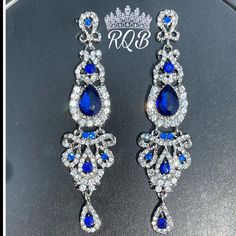 Competition Earrings Pageant Earrings Royal Blue Earrings Elegant Blue Crystal Chandelier Earrings, Formal Blue Chandelier Earrings, Elegant Blue Chandelier Earrings For Party, Blue Crystal Chandelier Earrings For Party, Blue Crystal Bridal Earrings, Blue Crystal Dangle Bridal Earrings, Blue Crystal Bridal Earrings With Matching Set, Blue Teardrop Chandelier Earrings For Pierced Ears, Royal Blue Accessories